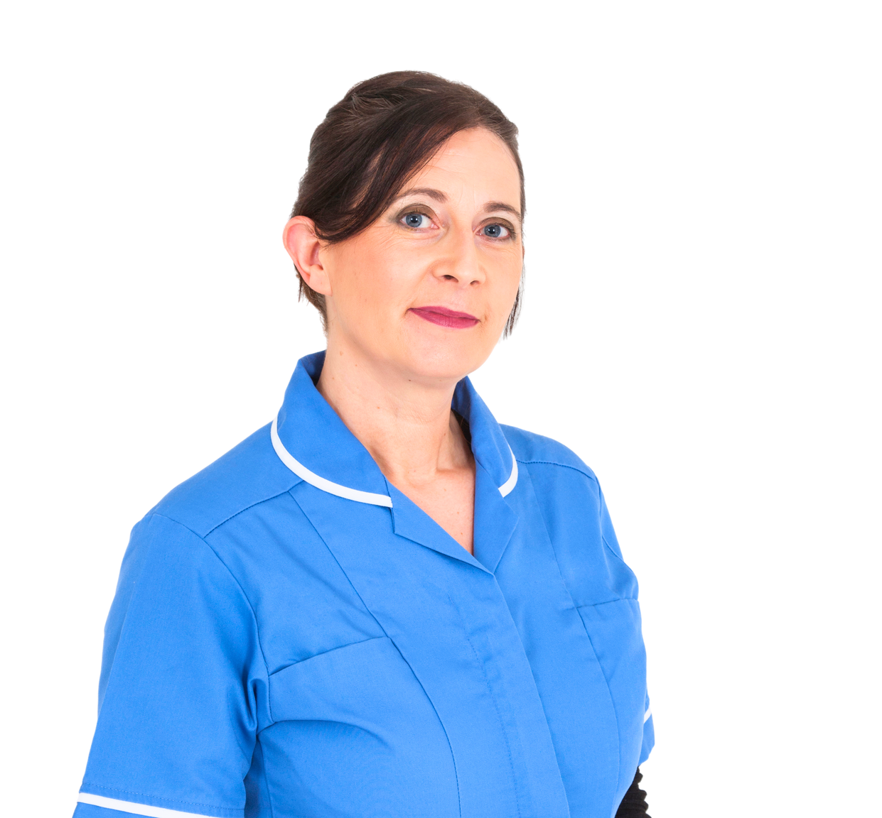 Valerie, the owner of Refresh by Valerie in a blue uniform standing in front of a white background